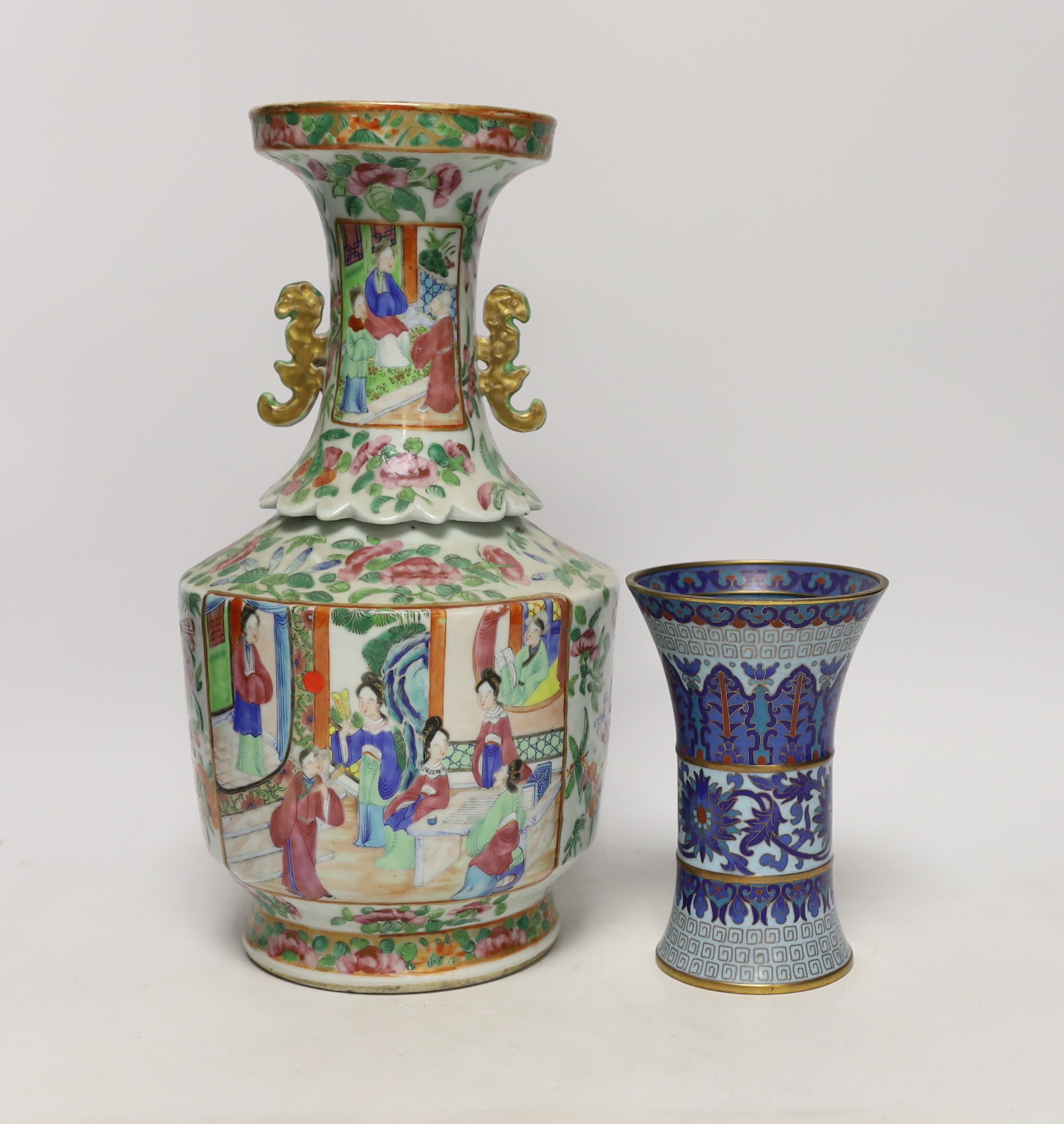 A 19th century Chinese famille rose two handled vase and a cloisonné gu beaker style vase, largest 33cm high